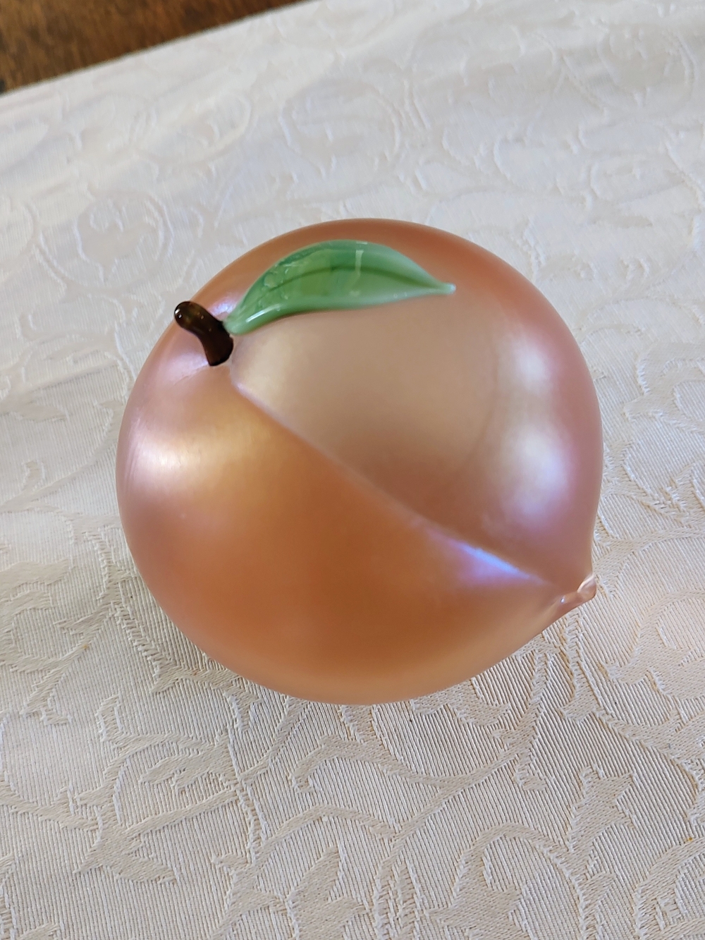 Vintage Orient and Flume iridescent peach glass handblown paperweight.